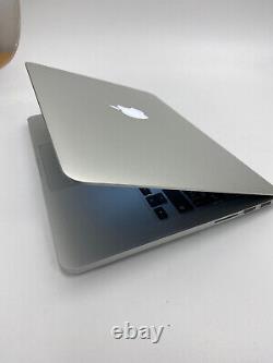 Apple MacBook Pro 2013 13 Retina i5 2.4GHz 128GB SSD 4GB RAM A1502 EMC 2678 would be translated to French as: Apple MacBook Pro 2013 13 pouces Retina i5 2,4 GHz 128 Go SSD 4 Go RAM A1502 EMC 2678.